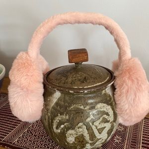 Pale pink fuzzy earmuffs. 😀